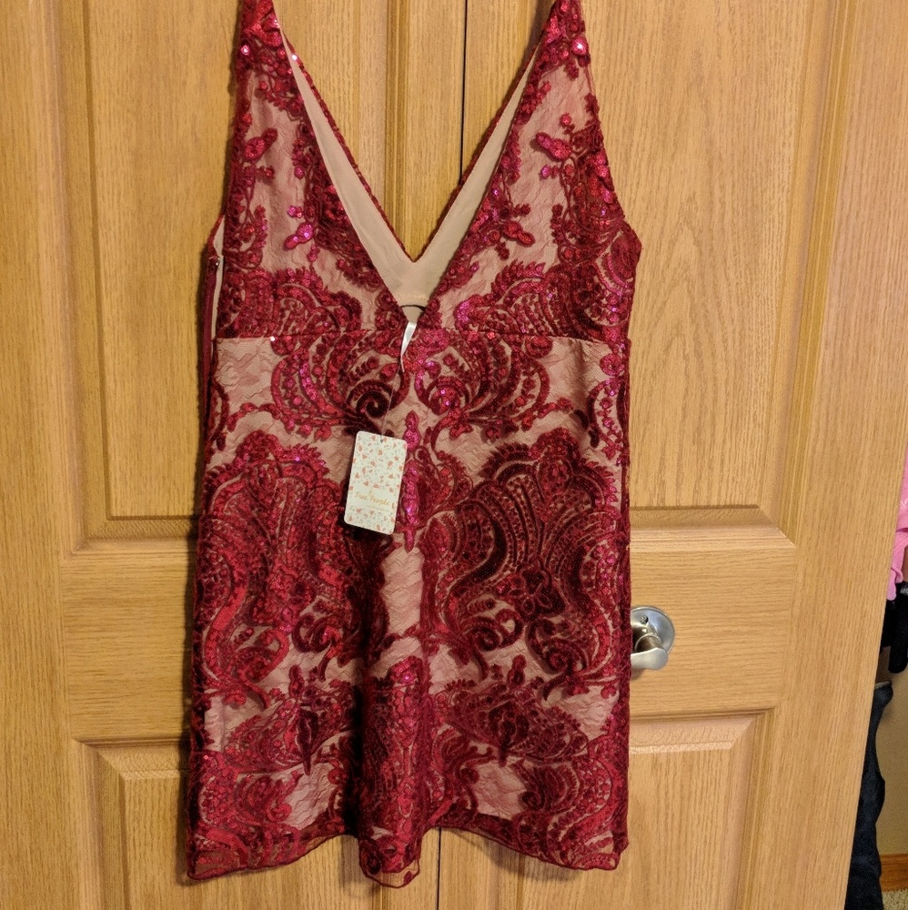 Free people low cut, short dress.